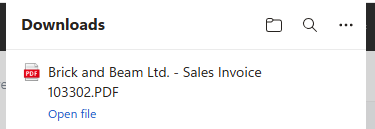 Our generated sales invoice available in the Downloads folder